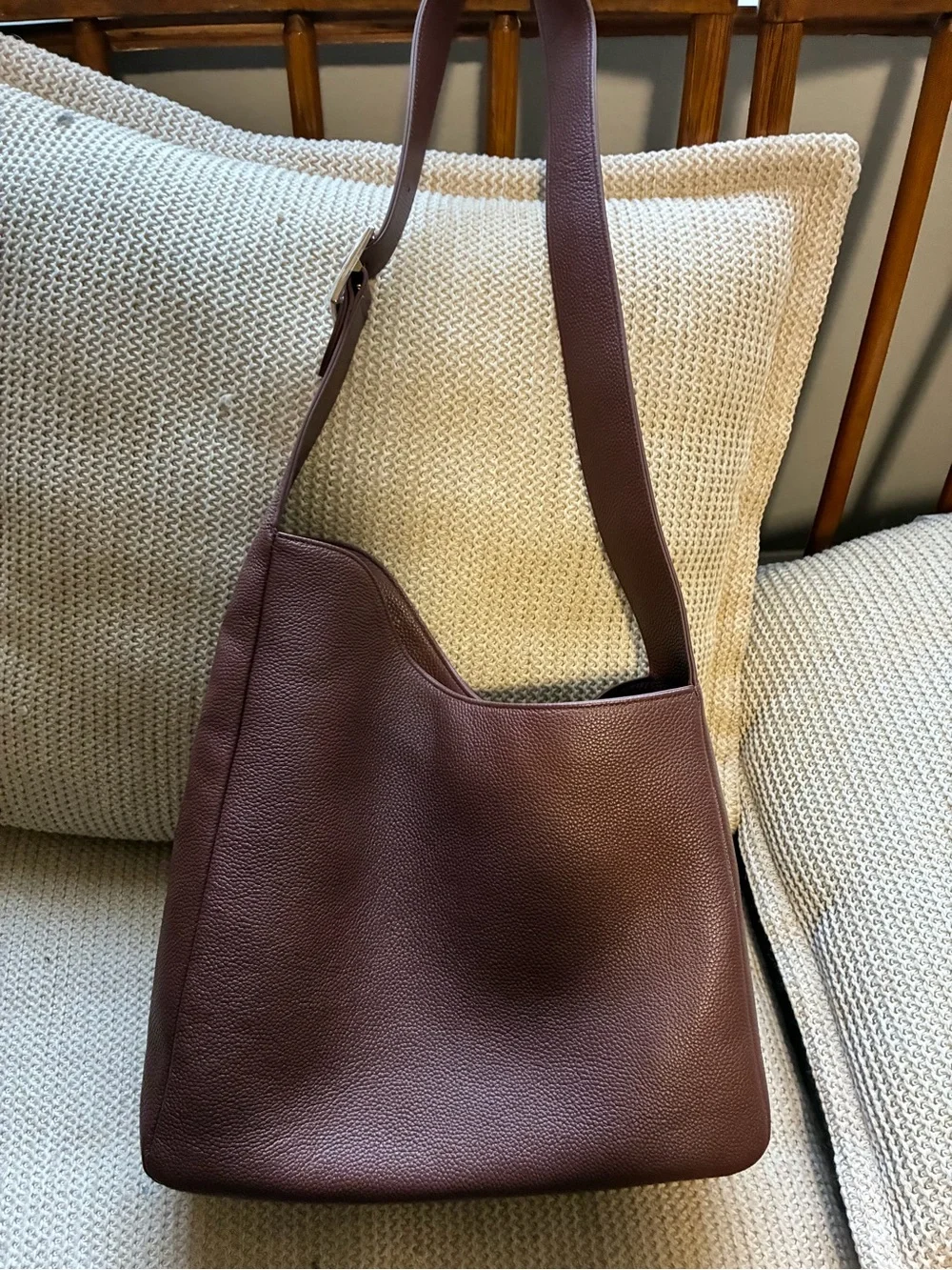 All on seven pebbled leather chocolate bag